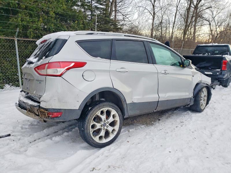 Photo 3 from auction – 2016 FORD ESCAPE TIT with VIN 1FMCU9JXXGUA80052