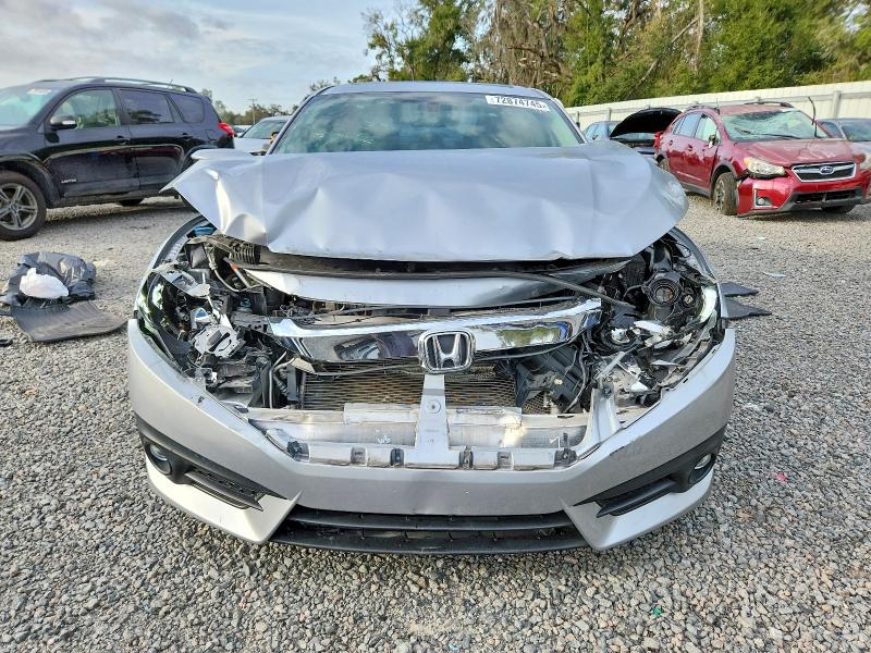 Photo 5 from auction – 2017 HONDA CIVIC EX with VIN 19XFC1F36HE001519