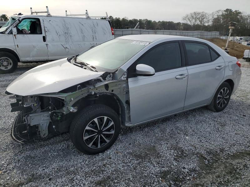 TOYOTA COROLLA 2015 with VIN 2T1BURHE9FC283031 - Photo from auction