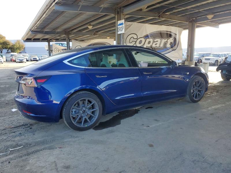 Photo 3 from auction – 2019 TESLA MODEL 3 with VIN 5YJ3E1EA2KF402872
