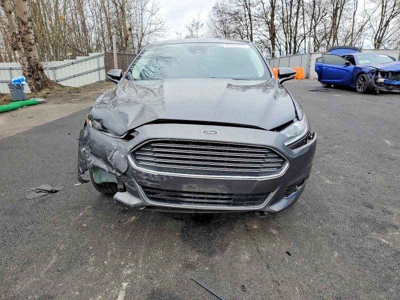 Photo 5 from auction – 2016 FORD FUSION with VIN 3FA6P0H94GR225465