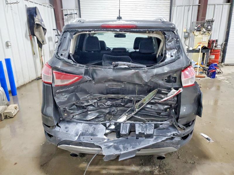 Photo 6 from auction – 2016 FORD ESCAPE TIT with VIN 1FMCU9JX1GUB12743
