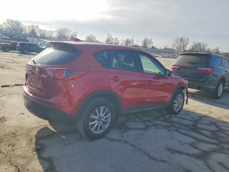 Photo 3 from auction – 2014 MAZDA CX-5 TOURI with VIN JM3KE2CY0E0400047