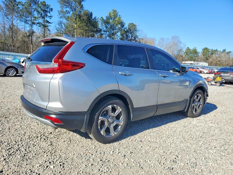 Photo 3 from auction – 2018 HONDA CR-V with VIN 7FARW1H89JE000575