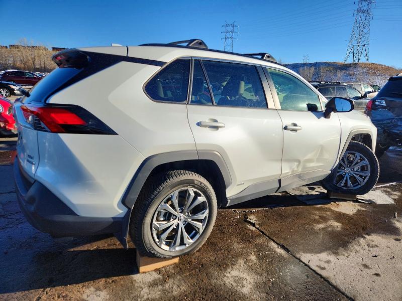 Photo 3 from auction – 2022 TOYOTA RAV4 XLE P with VIN JTMB6RFV4ND077579