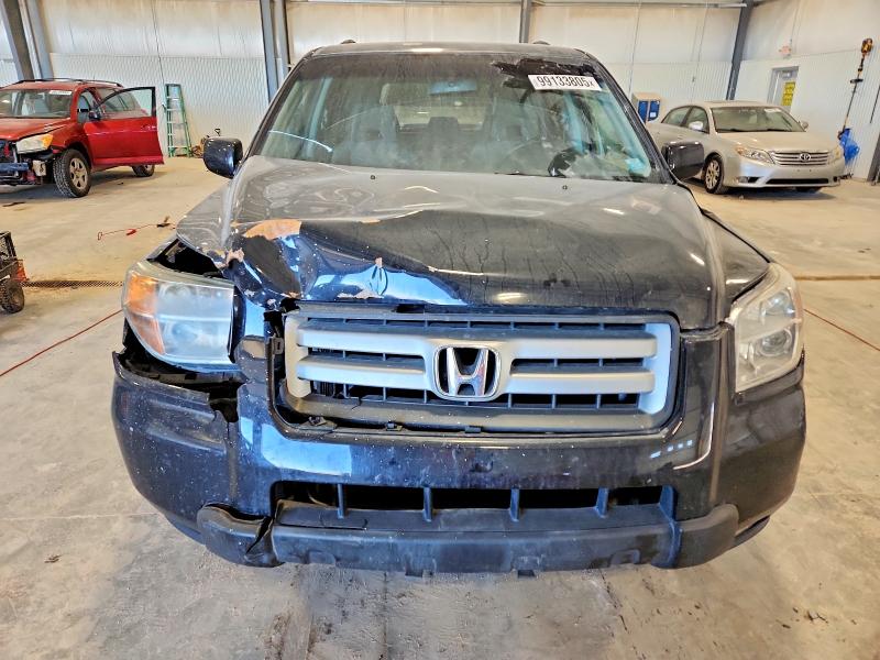 Photo 5 from auction – 2006 HONDA PILOT EX with VIN 2HKYF18476H543954