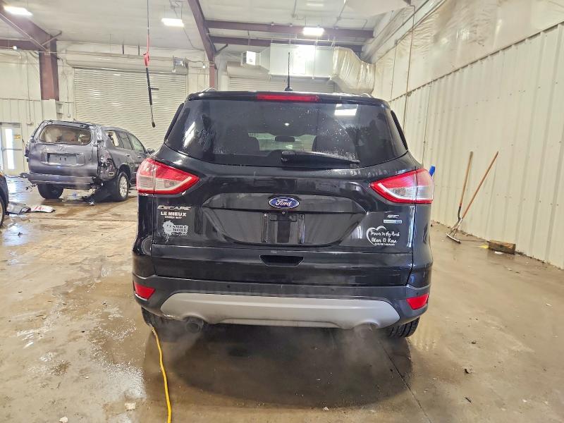 Zdjęcie 6 z aukcji – 2014 FORD ESCAPE SE z VIN 1FMCU9GX4EUB24485