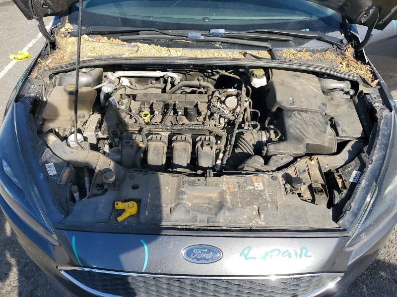 Photo 11 from auction – 2018 FORD FOCUS SEL with VIN 1FADP3M29JL304315