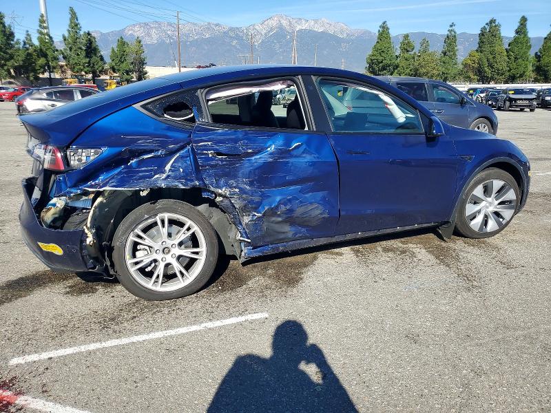 Photo 3 from auction – 2022 TESLA MODEL Y with VIN 7SAYGDEE6NA022300