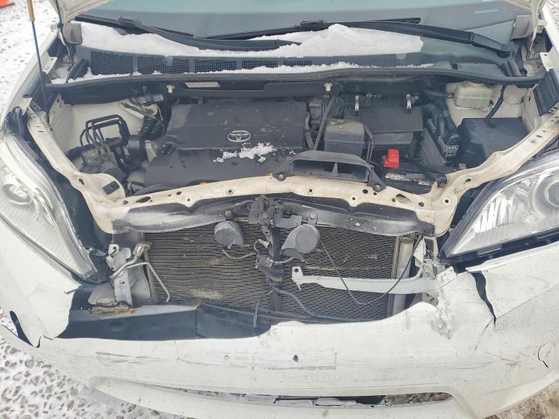 Photo 12 from auction – 2012 TOYOTA SIENNA LE with VIN 5TDKK3DC0CS203156