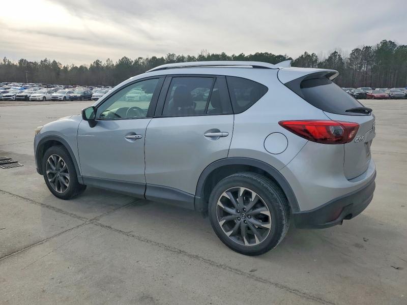 Photo 2 from auction – 2016 MAZDA CX-5 with VIN JM3KE2DY0G0790259