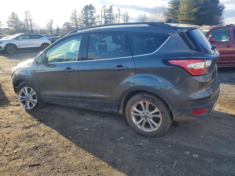 Photo 2 from auction – 2018 FORD ESCAPE with VIN 1FMCU9GD9JUC19110