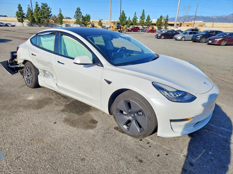 Photo 4 from auction – 2022 TESLA MODEL 3 with VIN 5YJ3E1EA8NF299235