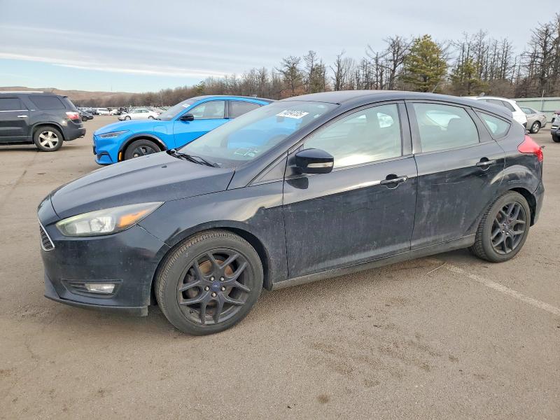 FORD FOCUS SE 2016 with VIN 1FADP3K25GL330633 - Photo from auction