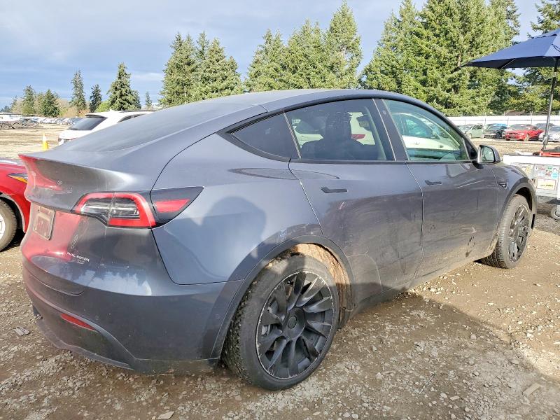 Photo 3 from auction – 2022 TESLA MODEL Y with VIN 7SAYGAEE2NF541023