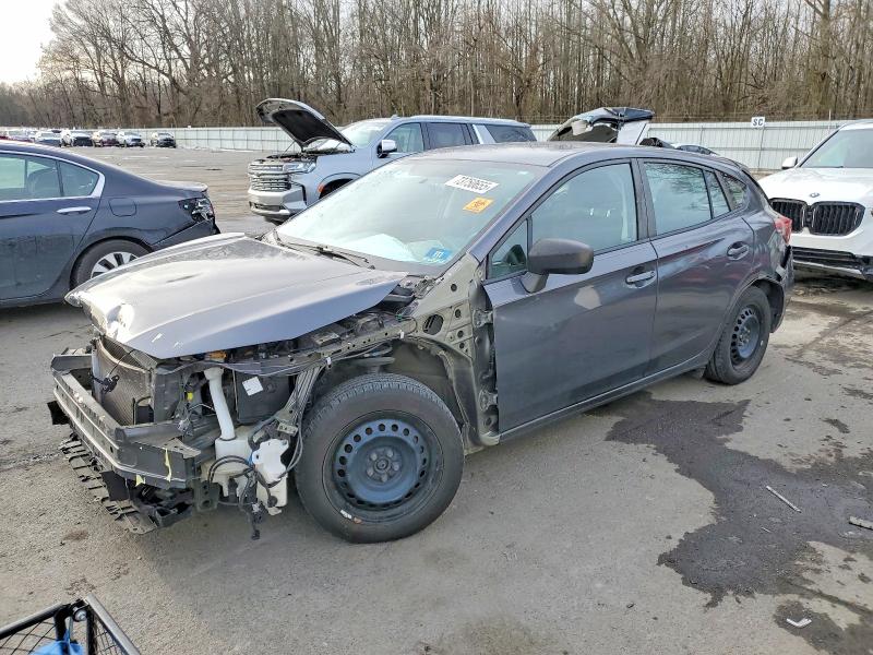 SUBARU IMPREZA 2019 with VIN 4S3GTAA61K3726112 - Photo from auction