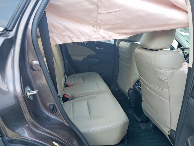 Photo 11 from auction – 2016 HONDA CR-V with VIN 2HKRM4H54GH724631