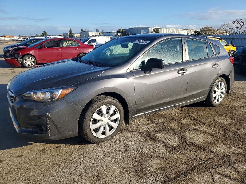 SUBARU IMPREZA 2019 with VIN 4S3GTAB62K3704313 - Photo from auction