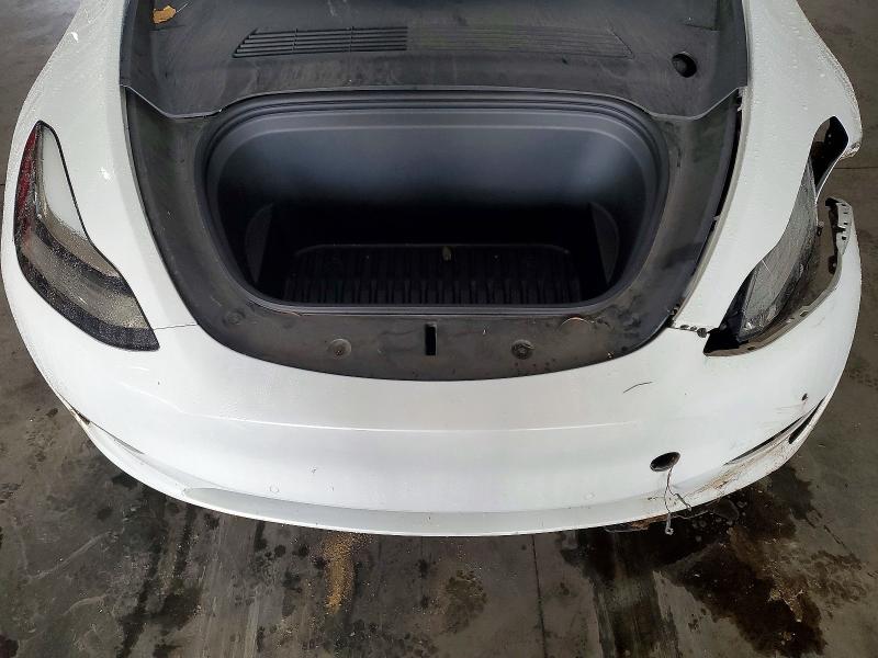Photo 12 from auction – 2021 TESLA MODEL Y with VIN 5YJYGDED2MF103543