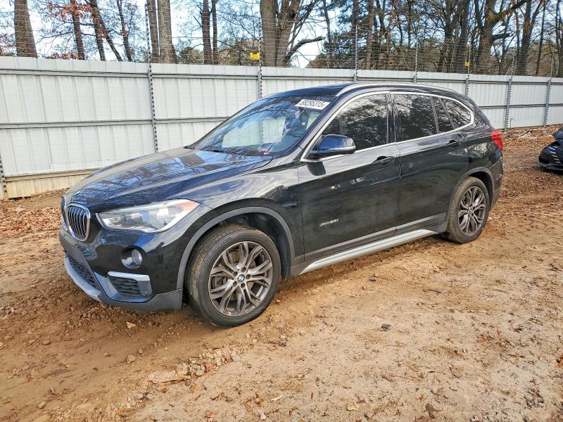 BMW X1 XDRIVE2 2017 with VIN WBXHT3Z34H4A52122 - Photo from auction
