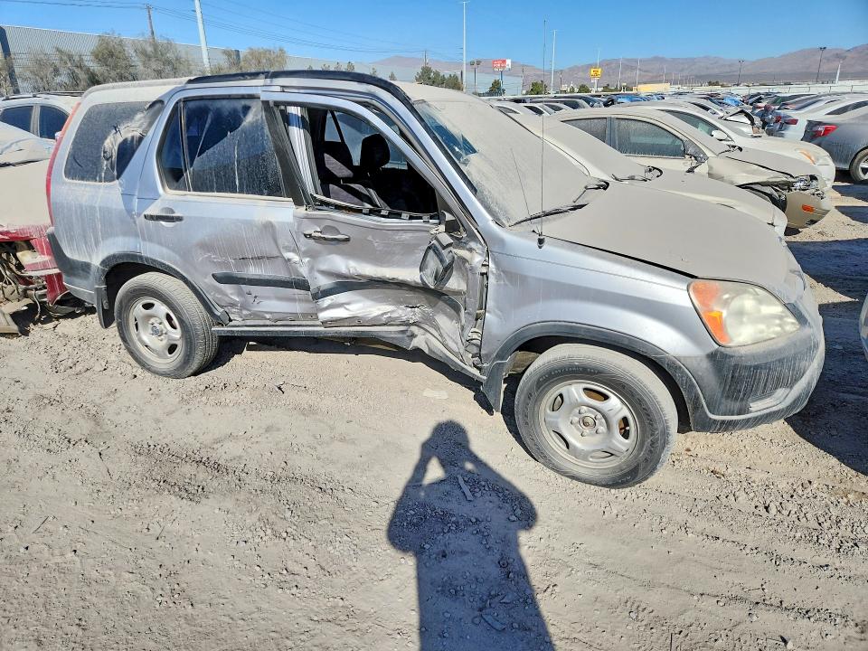 Photo 4 from auction – 2004 HONDA CR-V LX with VIN JHLRD68474C024020