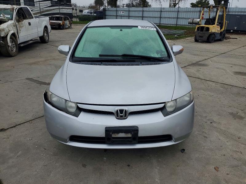 Photo 5 from auction – 2007 HONDA CIVIC HYBR with VIN JHMFA36277S022947