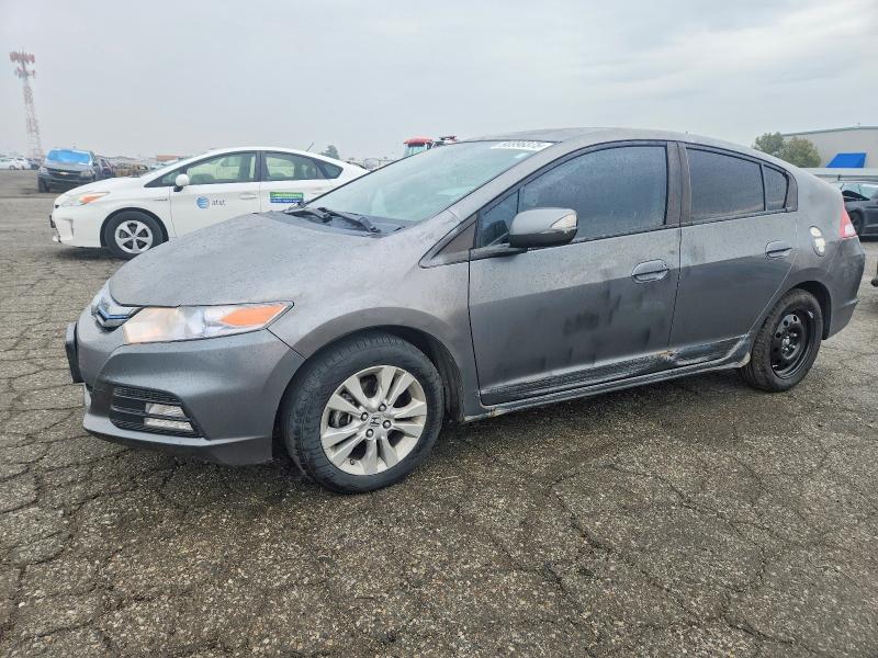 HONDA INSIGHT 2012 with VIN JHMZE2H77CS002910 - Photo from auction