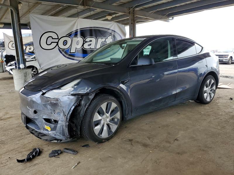 TESLA MODEL Y 2022 with VIN 7SAYGDEE8NF402502 - Photo from auction