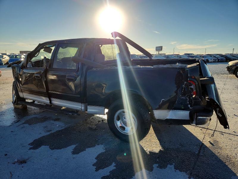 Photo 2 from auction – 2001 FORD F150 with VIN 1FTRW07WX1KF58203