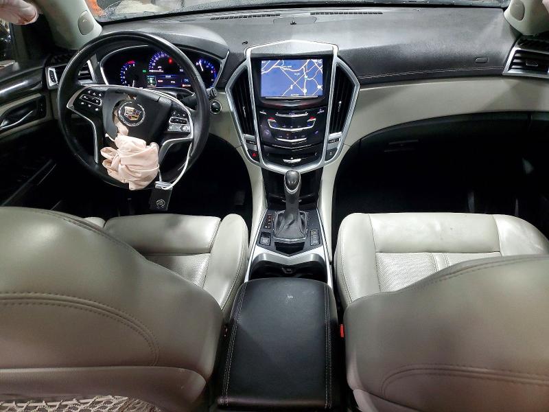 Photo 8 from auction – 2014 CADILLAC SRX PERFOR with VIN 3GYFNFE38ES657141