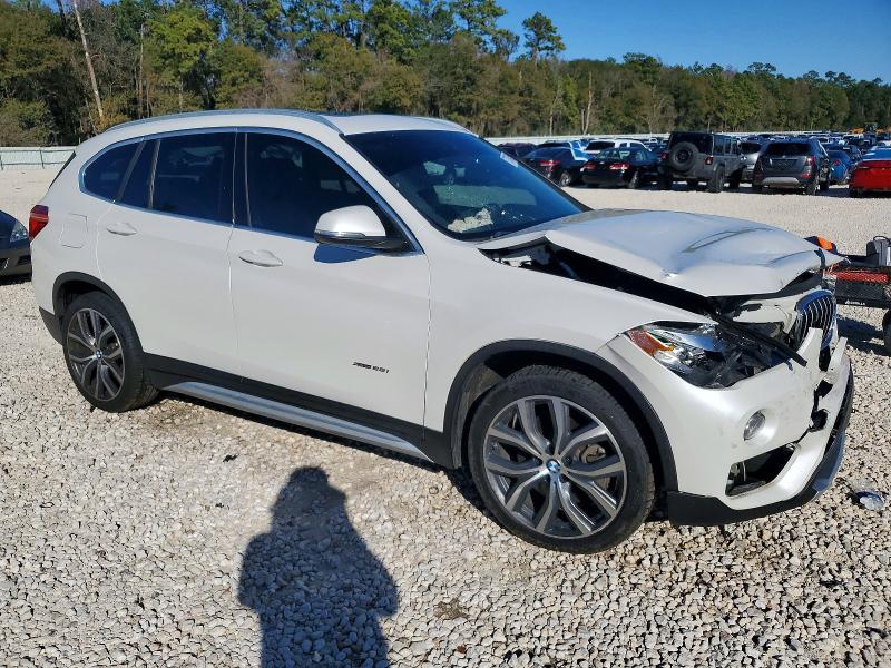 Photo 4 from auction – 2018 BMW X1 XDRIVE2 with VIN WBXHT3C30J5K25706