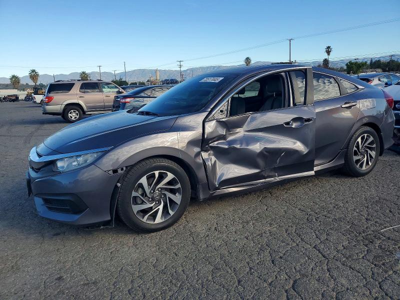 HONDA CIVIC EX 2016 with VIN 2HGFC2F74GH557258 - Photo from auction