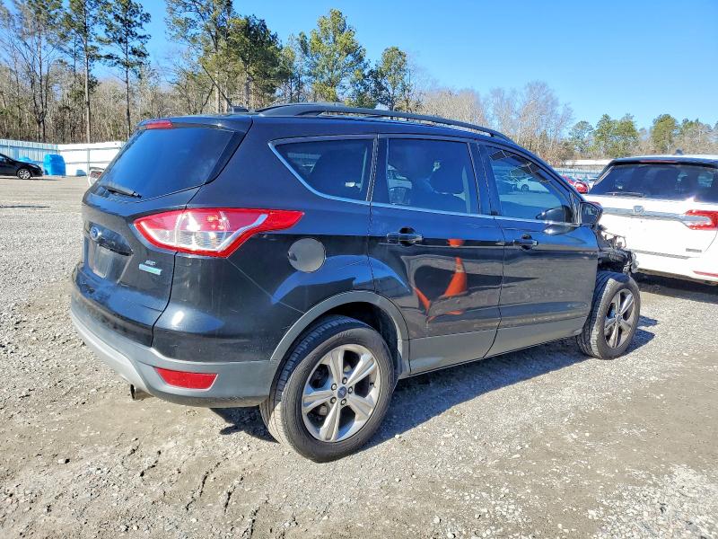 Photo 3 from auction – 2013 FORD ESCAPE with VIN 1FMCU0GX5DUD09154