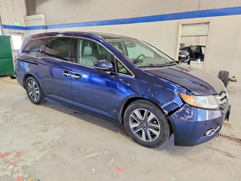 Photo 4 from auction – 2014 HONDA ODYSSEY TO with VIN 5FNRL5H96EB079388