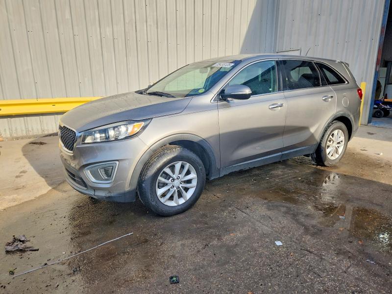 KIA SORENTO LX 2016 with VIN 5XYPG4A34GG050236 - Photo from auction