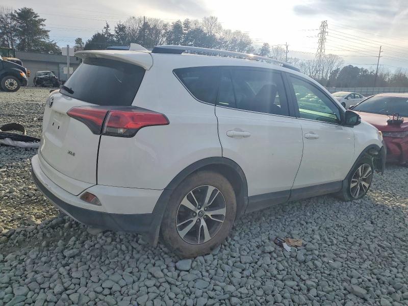 Photo 3 from auction – 2017 TOYOTA RAV4 XLE with VIN 2T3WFREV1HW387313