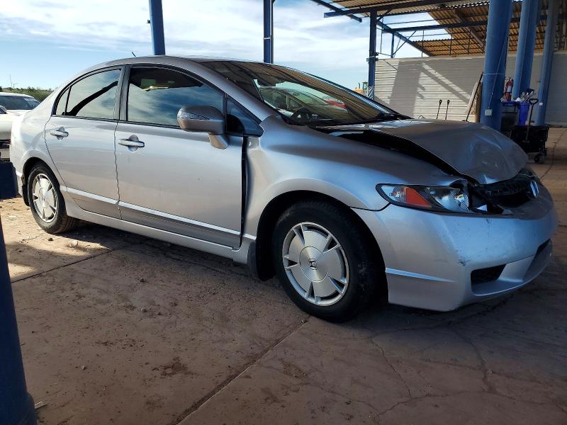 Photo 4 from auction – 2010 HONDA CIVIC HYBR with VIN JHMFA3F29AS007616