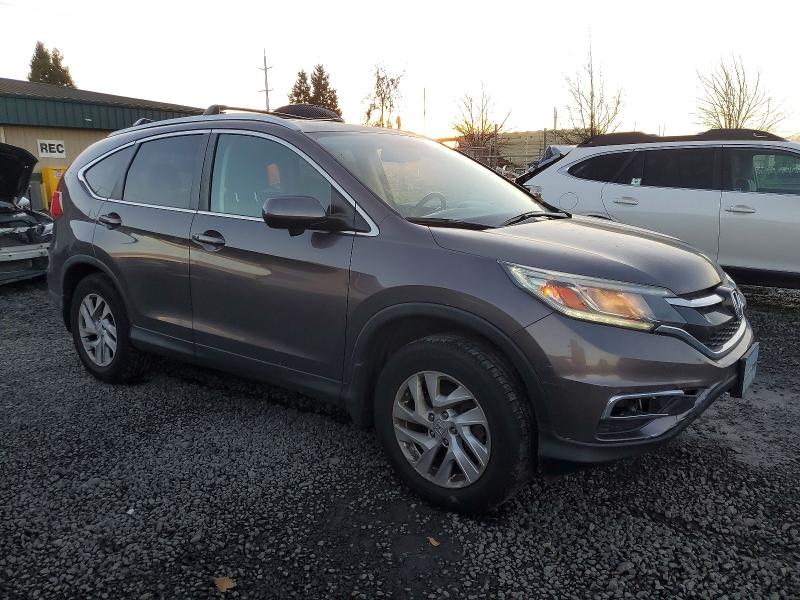 Photo 4 from auction – 2015 HONDA CR-V EXL with VIN 2HKRM4H74FH610080