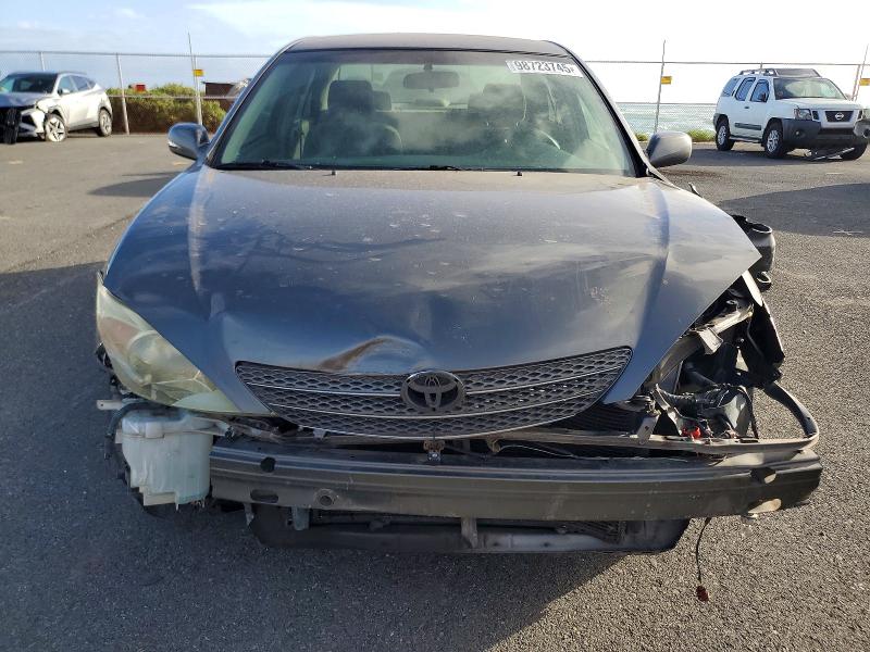 Photo 5 from auction – 2003 TOYOTA CAMRY LE with VIN JTDBF32K030138083