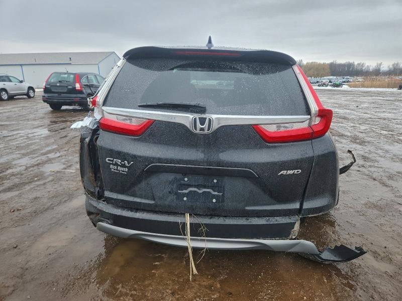 Photo 6 from auction – 2018 HONDA CR-V EX with VIN 7FARW2H51JE097041