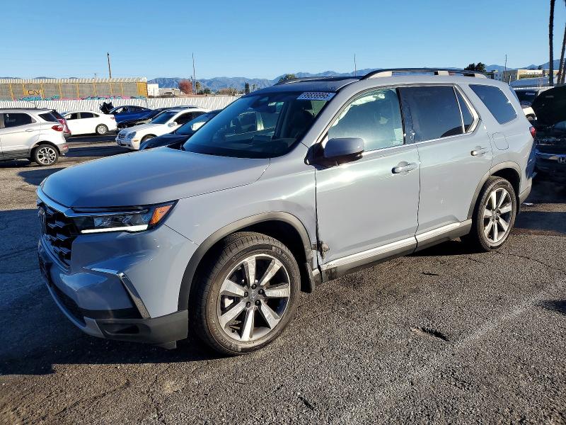 HONDA PILOT TOUR 2025 with VIN 5FNYG2H75SB027422 - Photo from auction