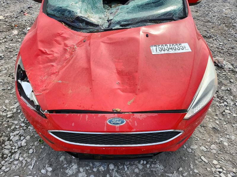 Photo 11 from auction – 2016 FORD FOCUS with VIN 1FADP3F20GL338228