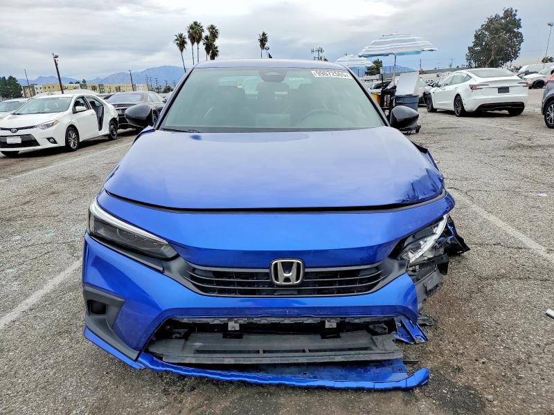 Photo 5 from auction – 2023 HONDA CIVIC SPOR with VIN 2HGFE2F52PH554142