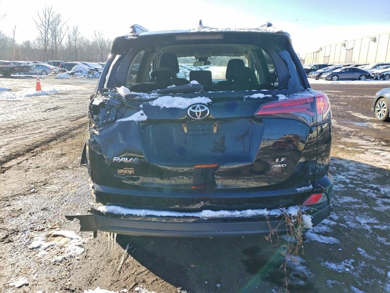 Photo 6 from auction – 2017 TOYOTA RAV4 LE with VIN 2T3BFREV2HW569021