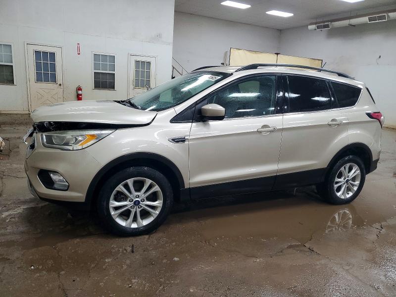 FORD ESCAPE 2018 with VIN 1FMCU9HD5JUA52386 - Photo from auction