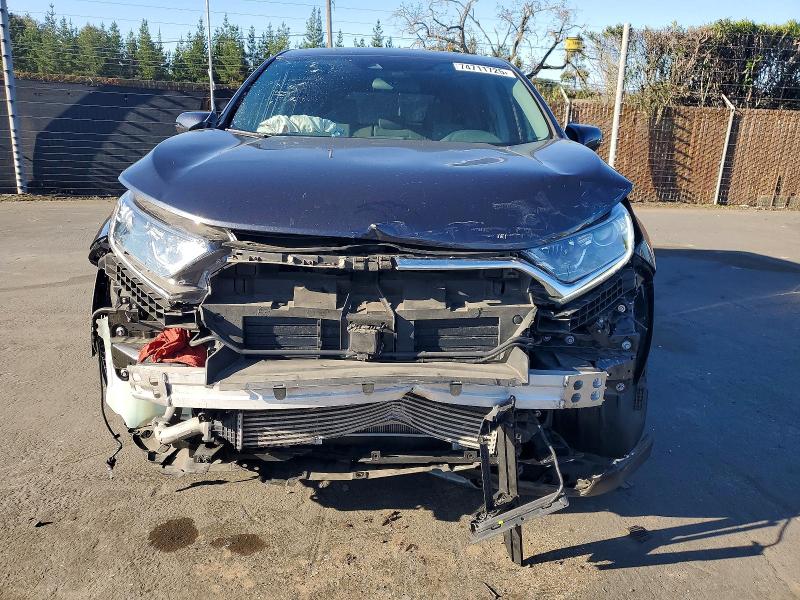 Photo 5 from auction – 2018 HONDA CR-V EX with VIN 7FARW2H53JE060783