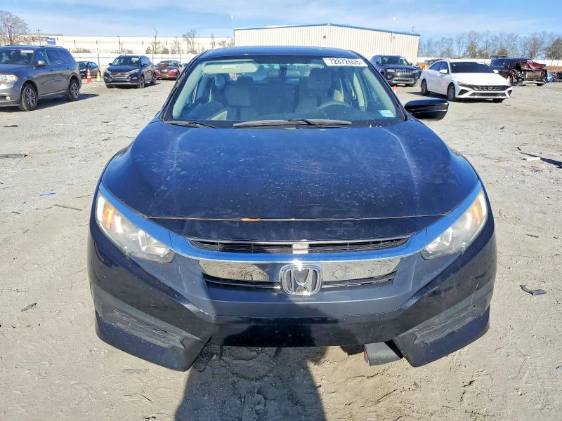 Photo 5 from auction – 2018 HONDA CIVIC with VIN 2HGFC2F74JH602190