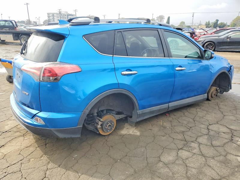 Photo 3 from auction – 2018 TOYOTA RAV4 with VIN 2T3YFREV9JW470244
