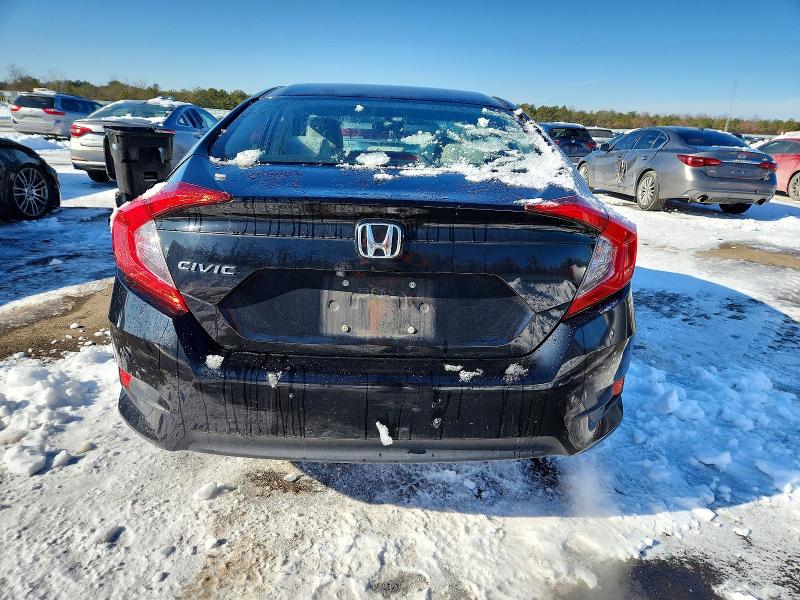 Photo 6 from auction – 2017 HONDA CIVIC LX with VIN 19XFC2F59HE210793