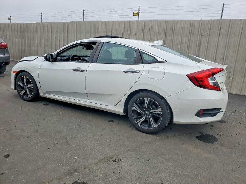 Photo 2 from auction – 2016 HONDA CIVIC TOUR with VIN 2HGFC1F92GH637993